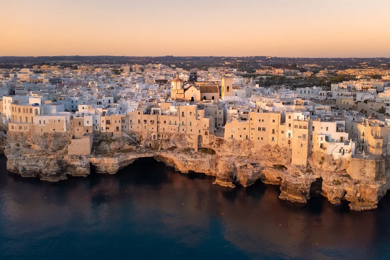 Polignano a Mare on its cliffs at dusk