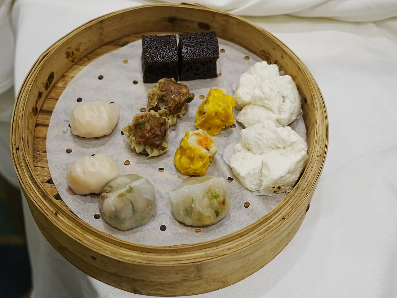 Dim sum in a bamboo steamer