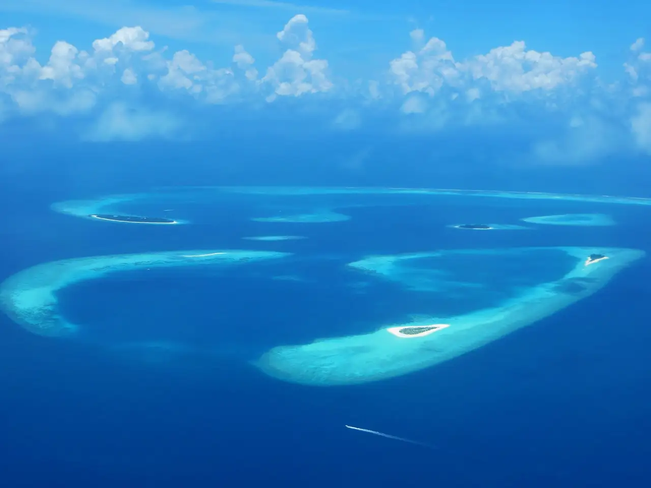 Ring-shaped reefs and islands of a Maldivian atoll