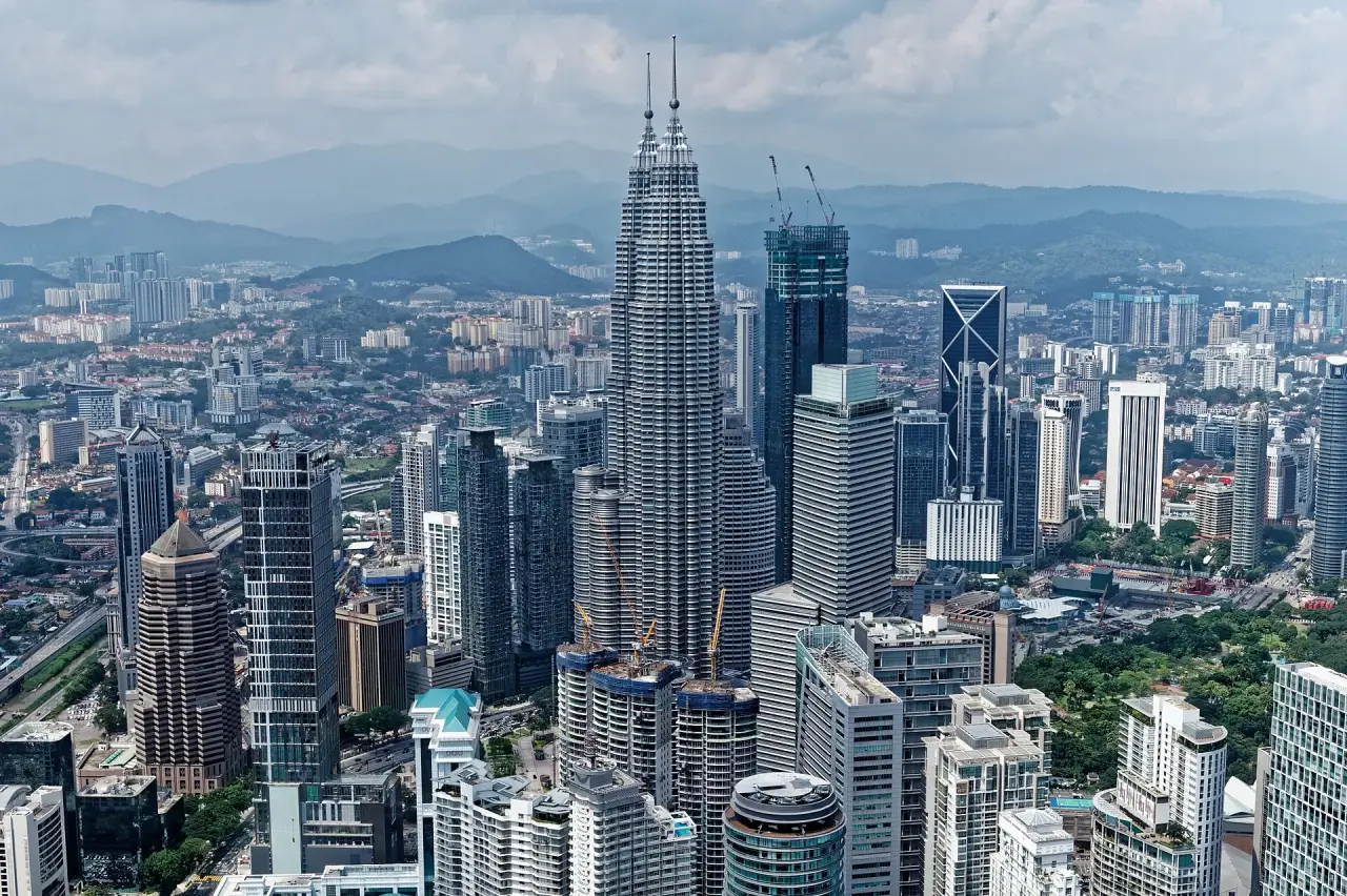 The Petronas Towers above central Kuala Lumpur