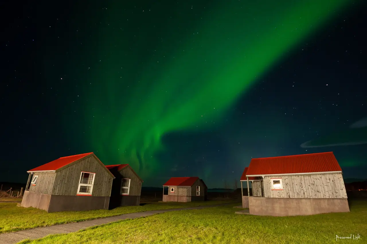 Northern lights over a countryside house in Iceland Northern lights over a countryside house in Iceland