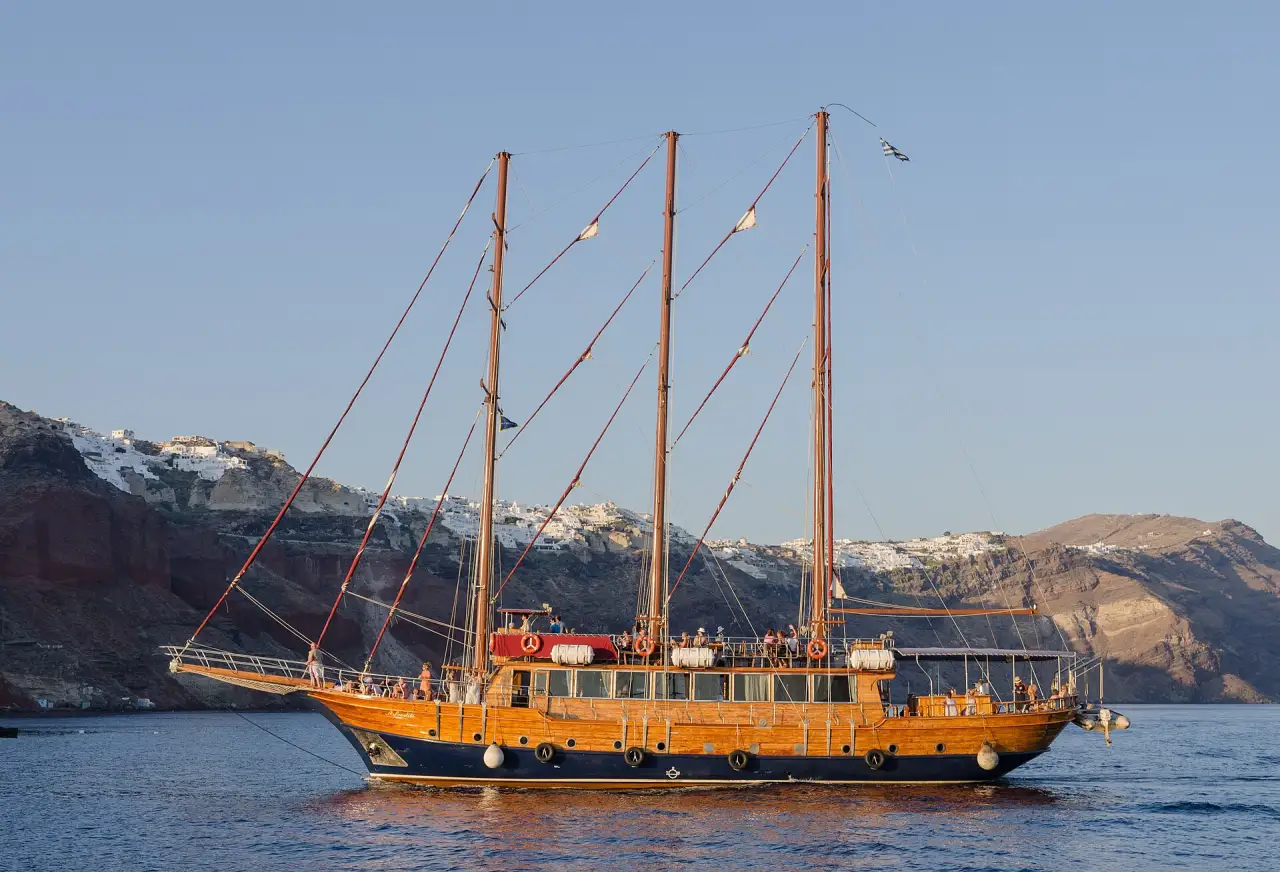 A traditional sailing boat in the Santorini caldera