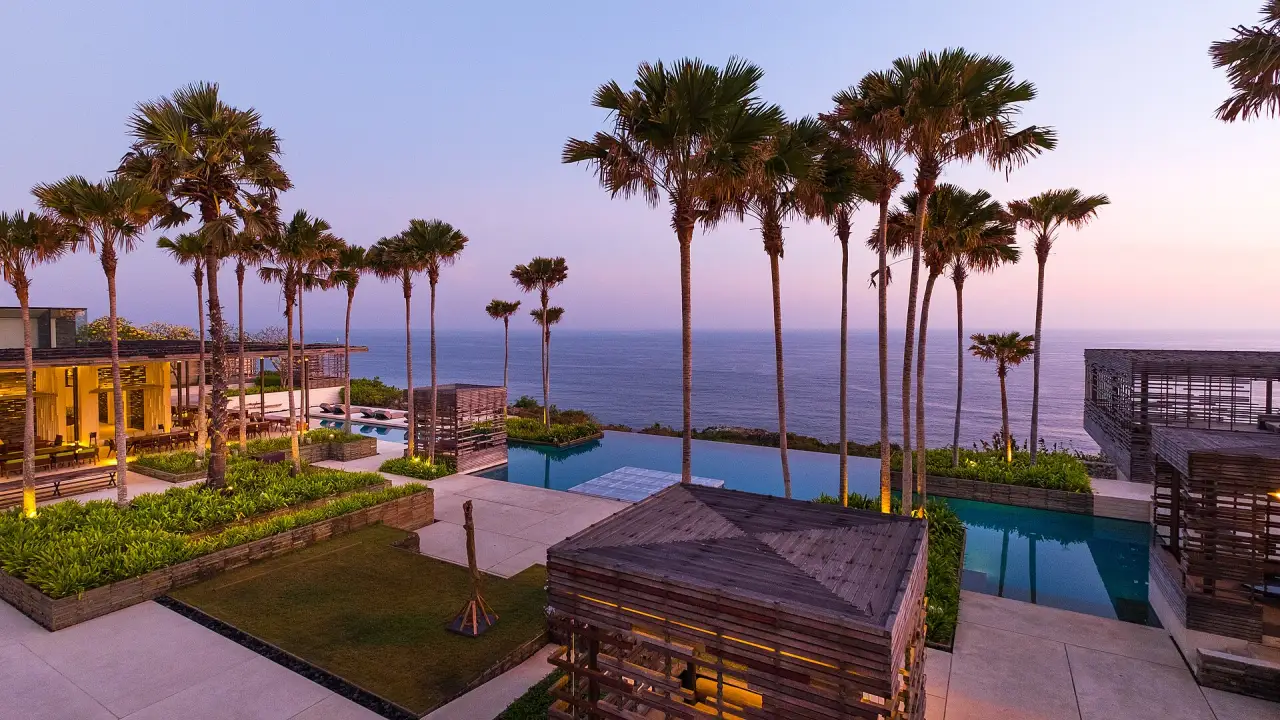 Clifftop villas and pools at dusk, Uluwatu Clifftop villas and pools at dusk, Uluwatu