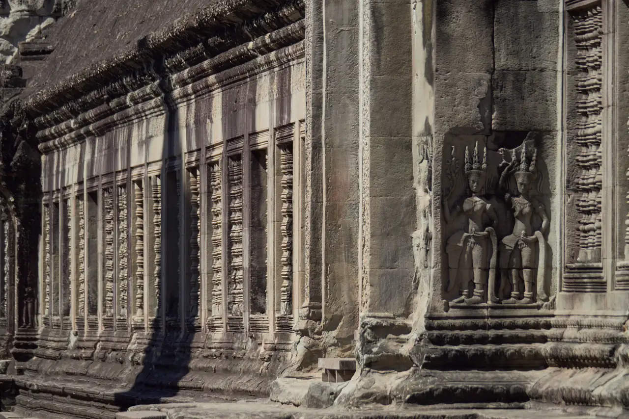 Carved apsaras on the walls of Angkor Wat