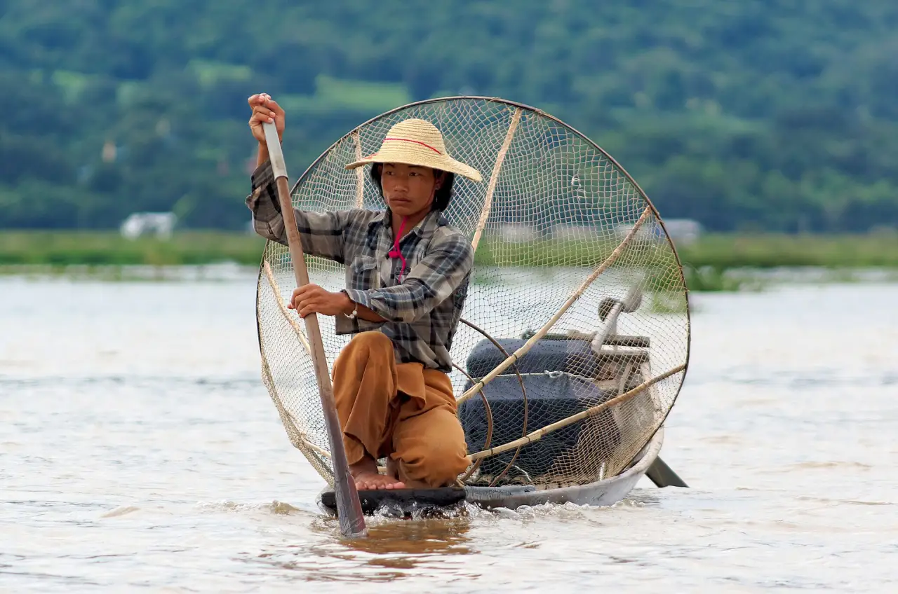 A leg-rowing fisherman on Inle Lake